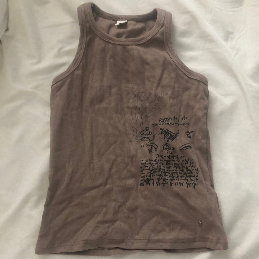 Tan tank top with sketches on top